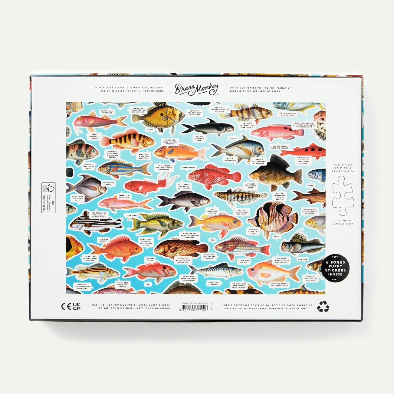 Box of a children's puzzle featuring various fish illustrations on a white background